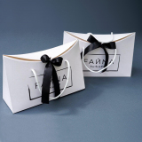 Бумажный пакет с ручками-лентами