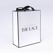 Стандартный бумажный пакет с ручками-лентами